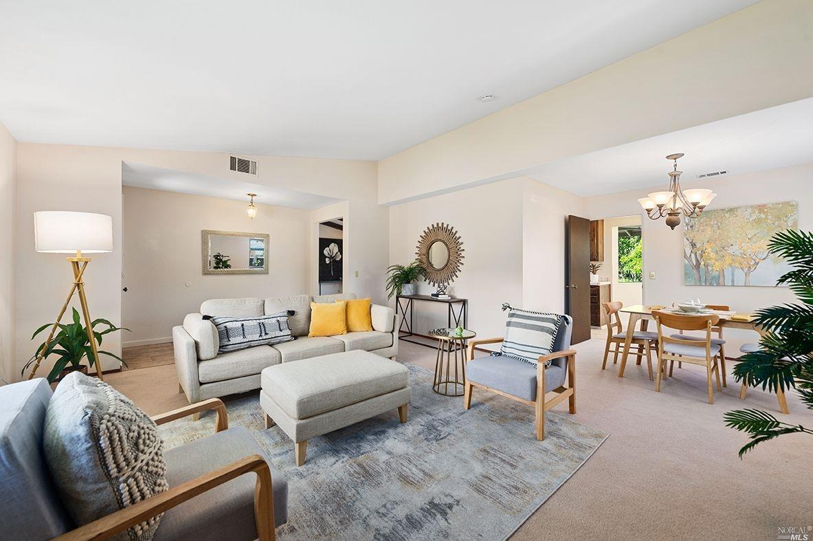 1634 Chapman Way Santa Rosa, CA 95403 - Photo 1 of 1 a living room with furniture wooden floor and a chandelier