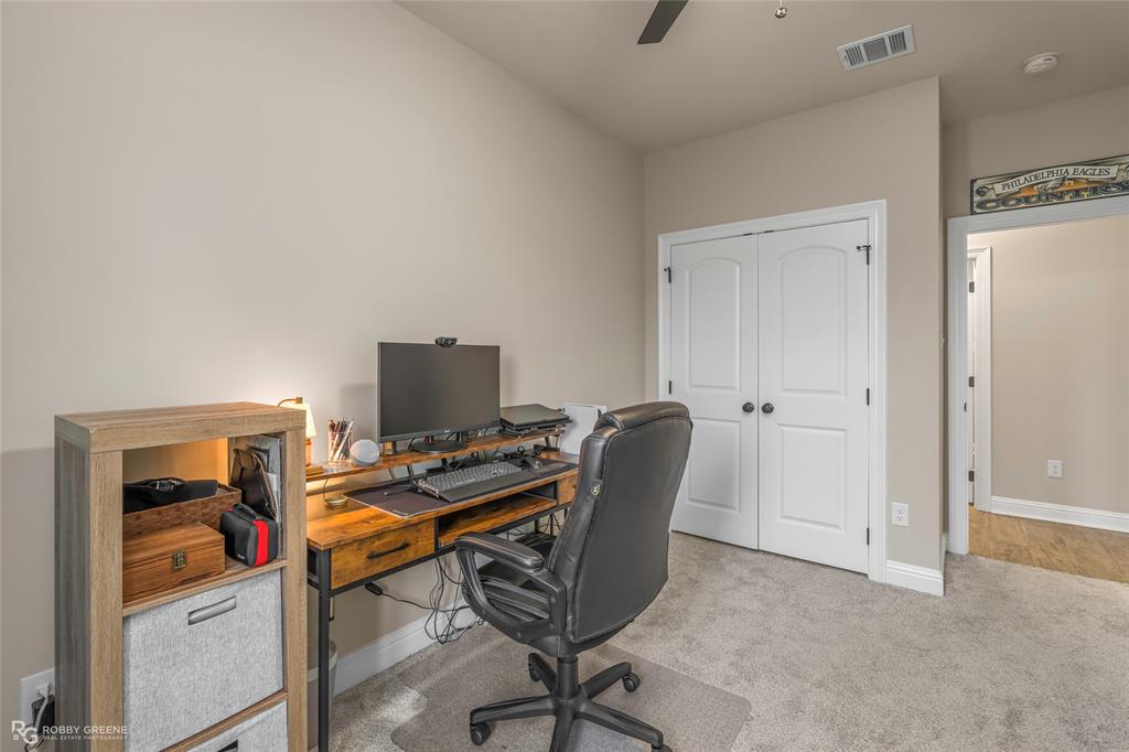 122 Brimestone Loop Benton, LA 71006 - Photo 24 of 33 a view of a workspace with furniture and a window