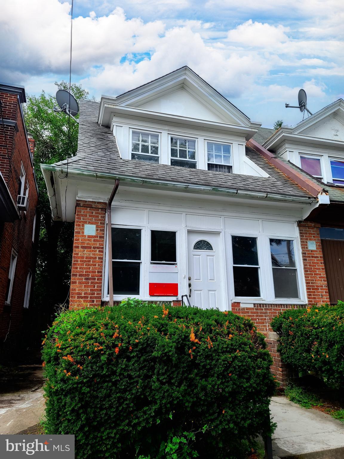 1008 McDowell Avenue Chester, PA 19013 - Photo 1 of 16 a front view of a house with an outdoor space