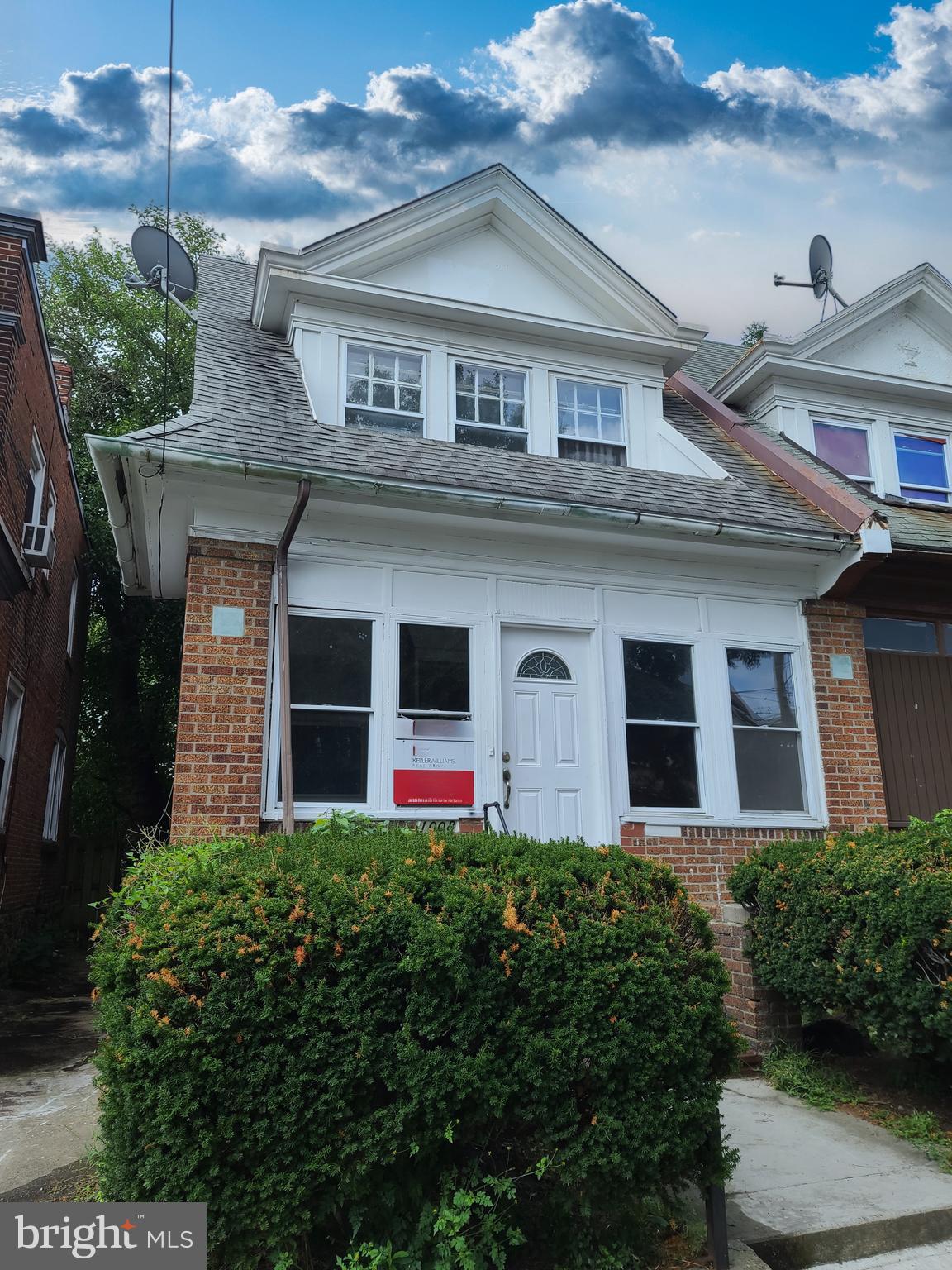 1008 McDowell Avenue Chester, PA 19013 - Photo 16 of 16 a front view of a house with plants
