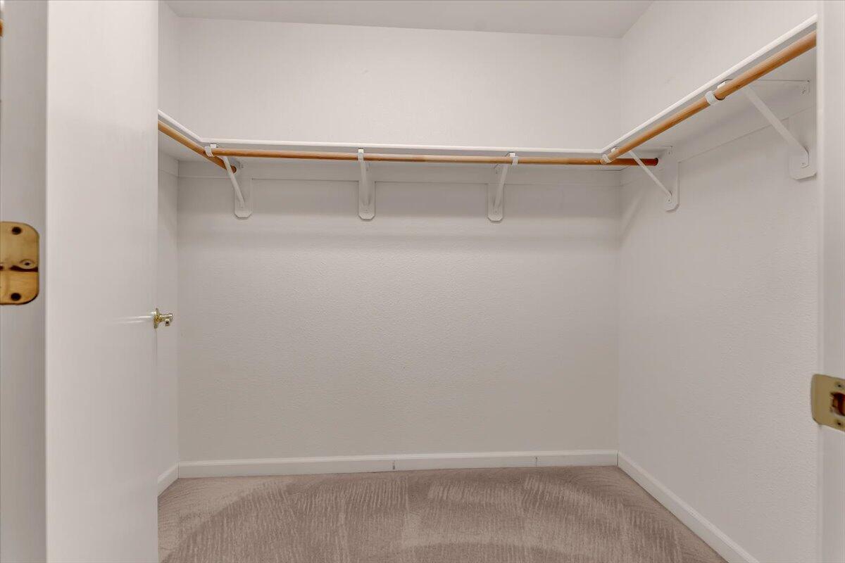 738 Stonebriar Trail Redding, CA 96003 - Photo 17 of 40 a view of an empty walk in closet