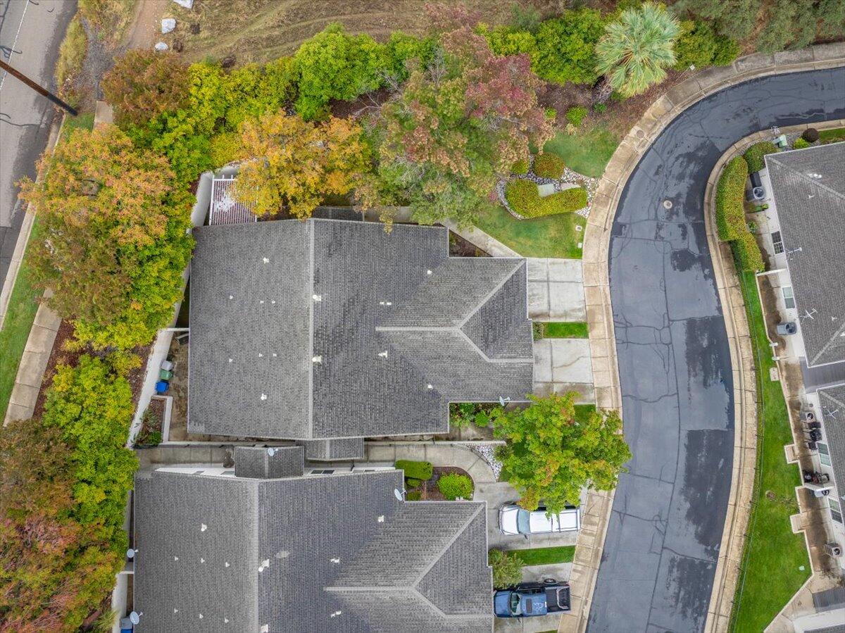 738 Stonebriar Trail Redding, CA 96003 - Photo 2 of 40 an aerial view of a house with a swimming pool