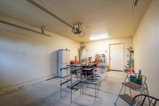 a view of a dining room with furniture and a rug