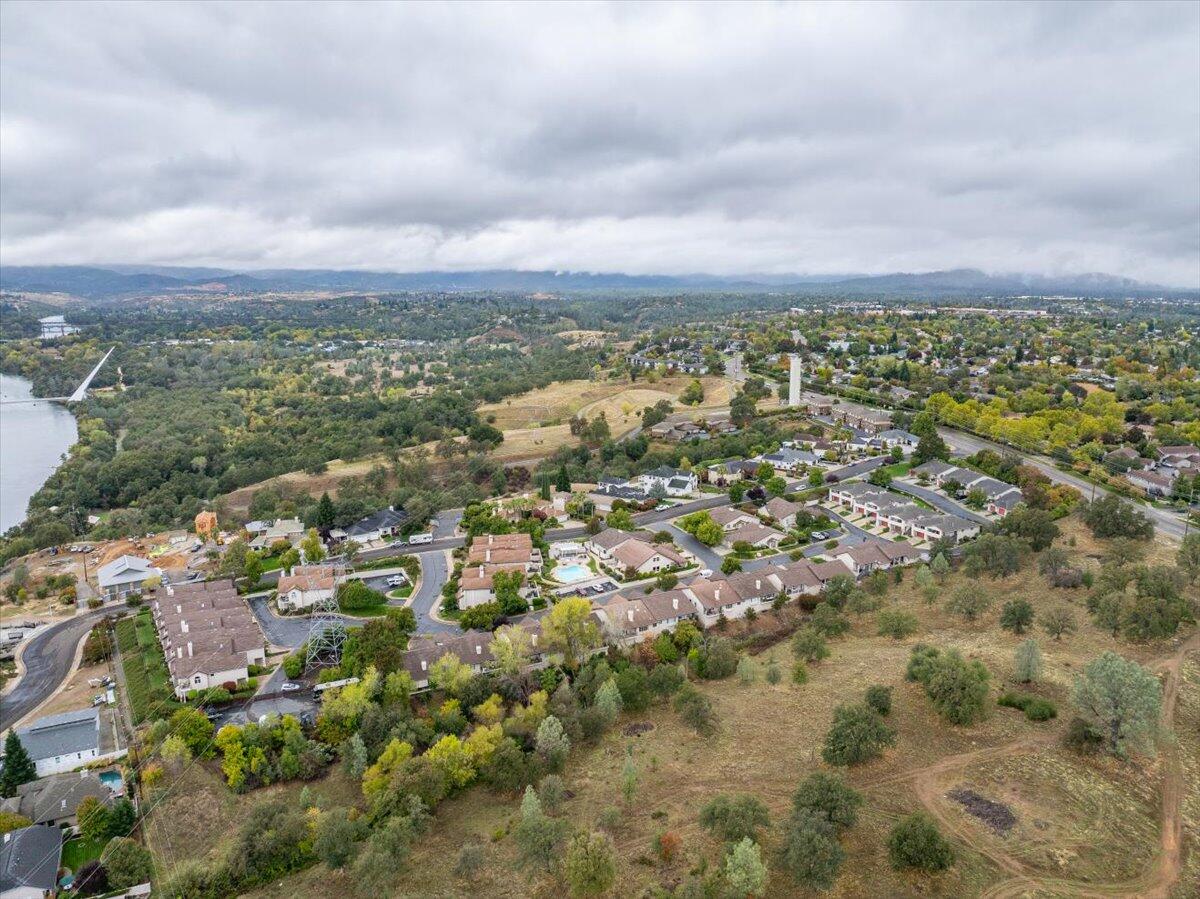 738 Stonebriar Trail Redding, CA 96003 - Photo 36 of 40 an aerial view of residential building and trees around