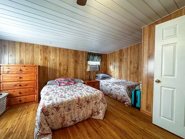 a bedroom with a bed and a closet