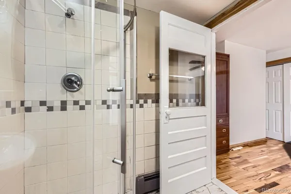 a view of a bathroom with tub and window