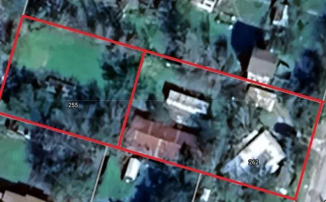 a view of a car in front of house