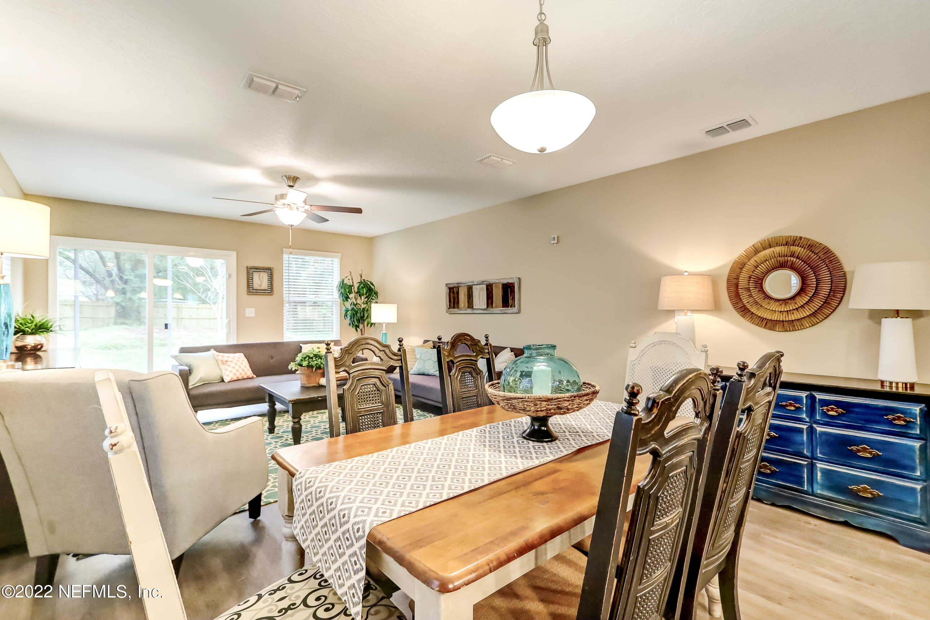 2209 Kistlers Rdg Way Jacksonville, FL 32221 - Photo 15 of 22 a view of a dining room with furniture window and outside view