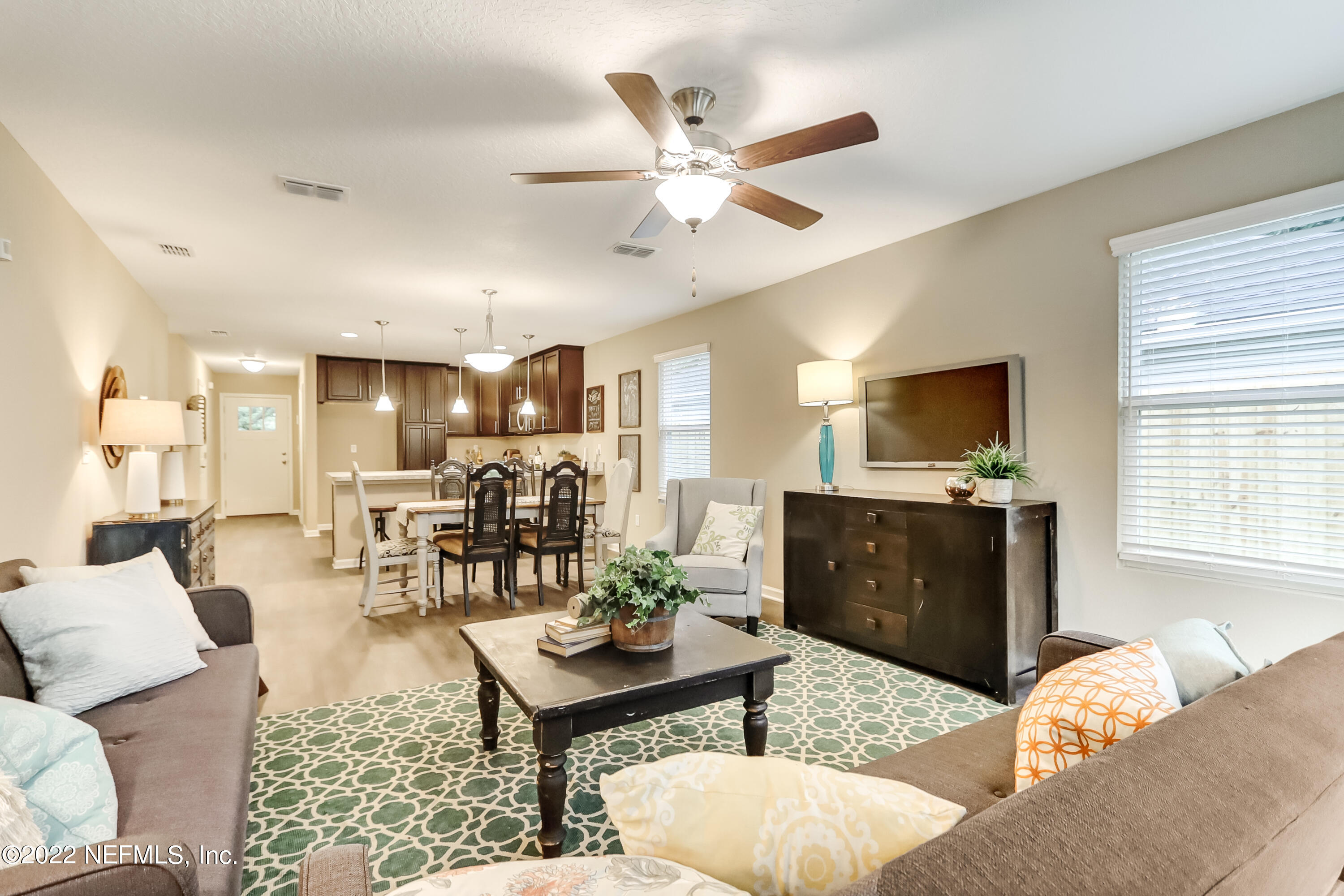 2209 Kistlers Rdg Way Jacksonville, FL 32221 - Photo 20 of 22 a living room with furniture kitchen view and a window