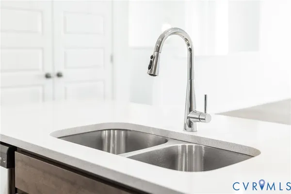 a close view of a sink and tap