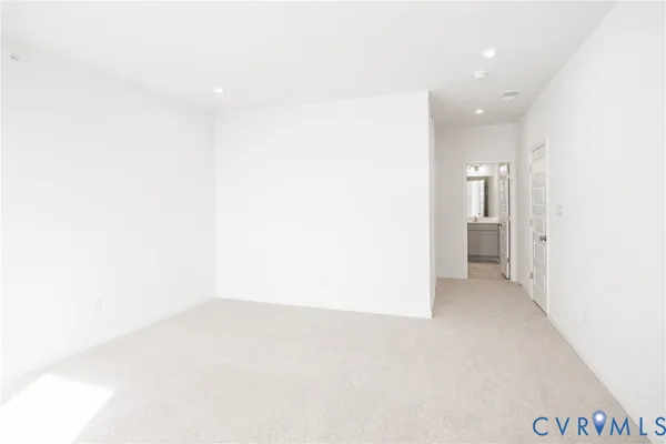 a view of a balcony with wooden floor