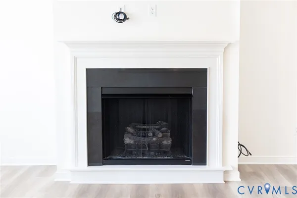 a white building with a fireplace