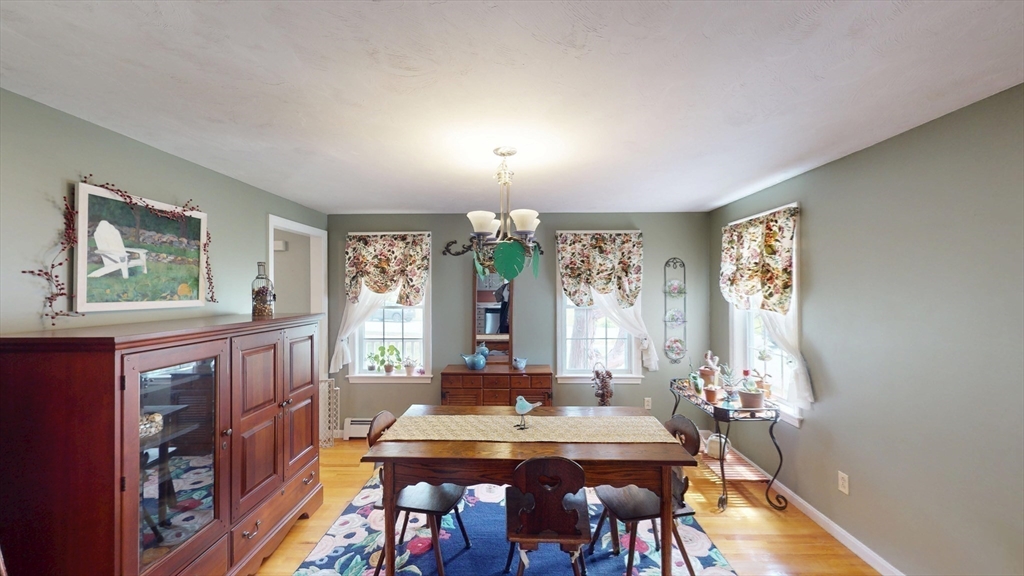 11 Valley View Circle Rutland, MA 01543 - Photo 13 of 38 a view of a dining room with furniture window and wooden floor
