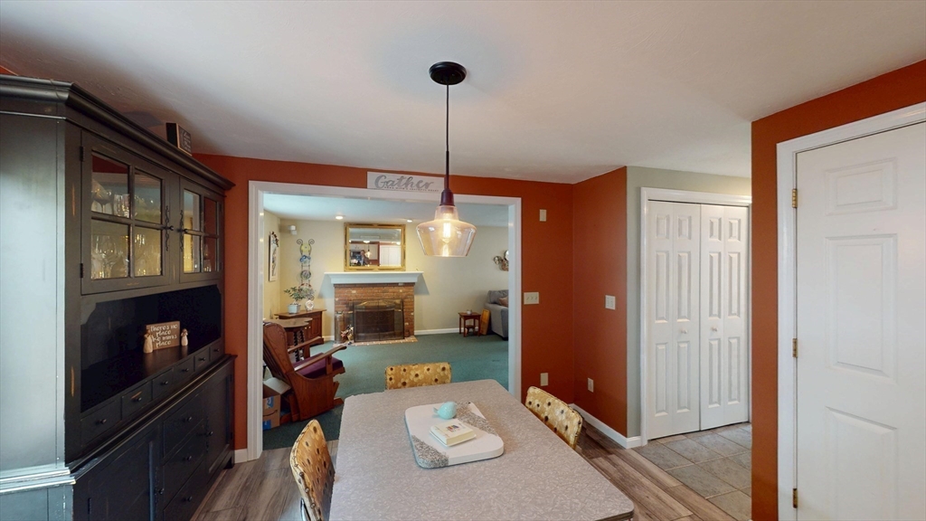 11 Valley View Circle Rutland, MA 01543 - Photo 15 of 38 a living room with furniture and a fireplace