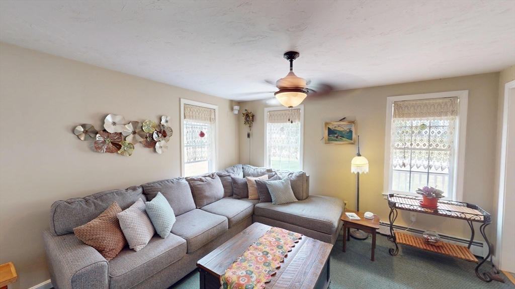 11 Valley View Circle Rutland, MA 01543 - Photo 19 of 38 a living room with furniture and a window