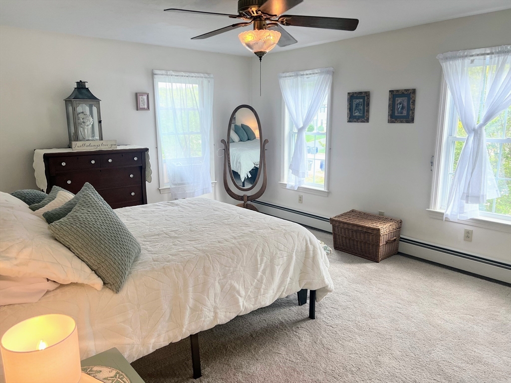 11 Valley View Circle Rutland, MA 01543 - Photo 21 of 38 a bedroom with a bed dresser and a window