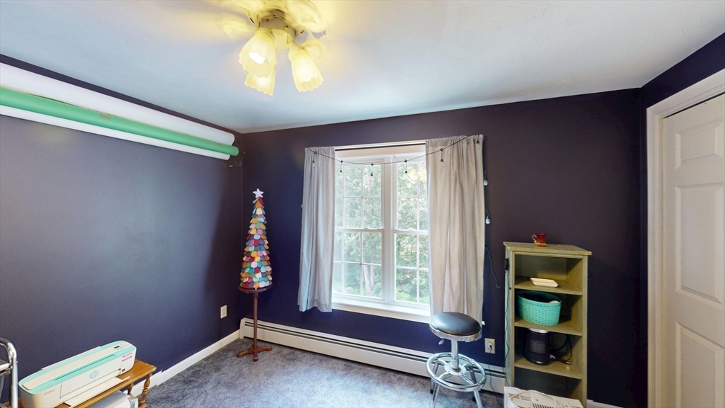 11 Valley View Circle Rutland, MA 01543 - Photo 27 of 38 a living room with furniture and a window