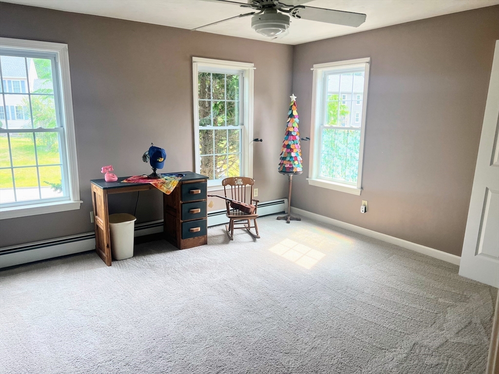 11 Valley View Circle Rutland, MA 01543 - Photo 29 of 38 a view of a workspace with furniture and a window