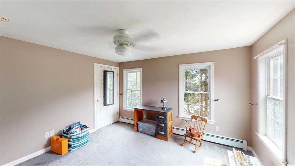 11 Valley View Circle Rutland, MA 01543 - Photo 31 of 38 a view of a room with gym equipment and a window
