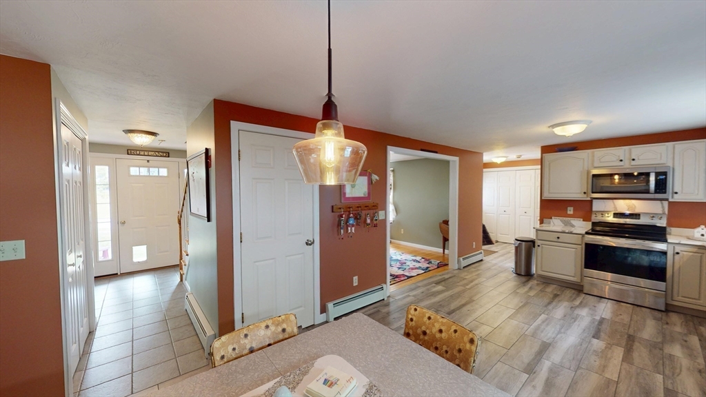 11 Valley View Circle Rutland, MA 01543 - Photo 6 of 38 a kitchen with stainless steel appliances granite countertop a refrigerator and a stove top oven
