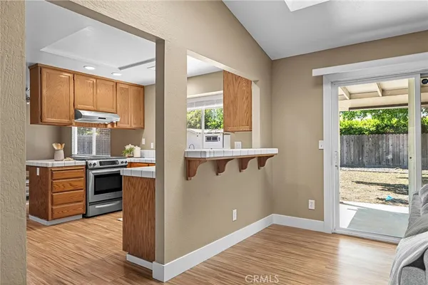 a view of kitchen with wooden floor