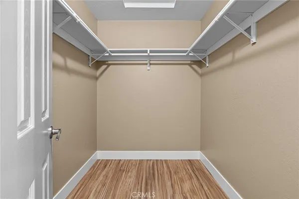 a view of room with racks on the wall