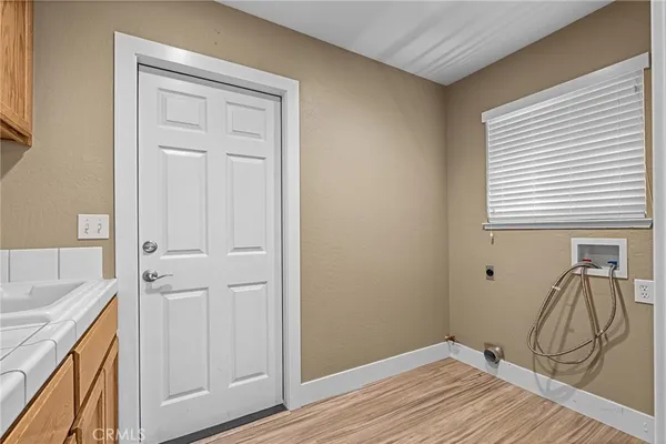 a view of a storage and utility room in a house