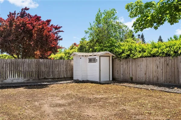 a view of a porch with a small yard