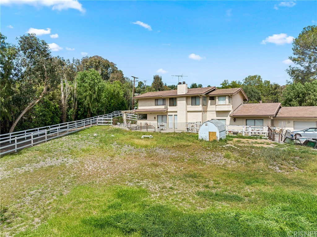24862 Eldorado Meadow Road Hidden Hills, CA 91302 - Photo 13 of 16 a view of a house with a swimming pool