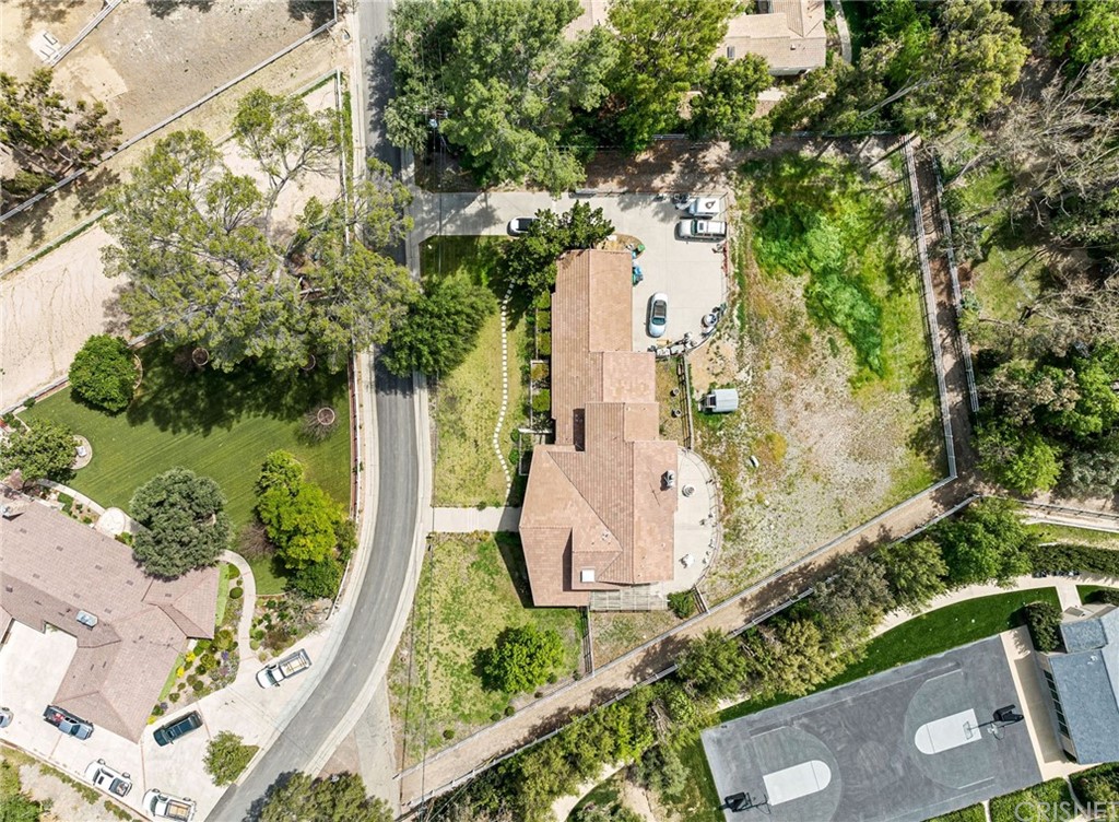24862 Eldorado Meadow Road Hidden Hills, CA 91302 - Photo 14 of 16 an aerial view of a house with a yard