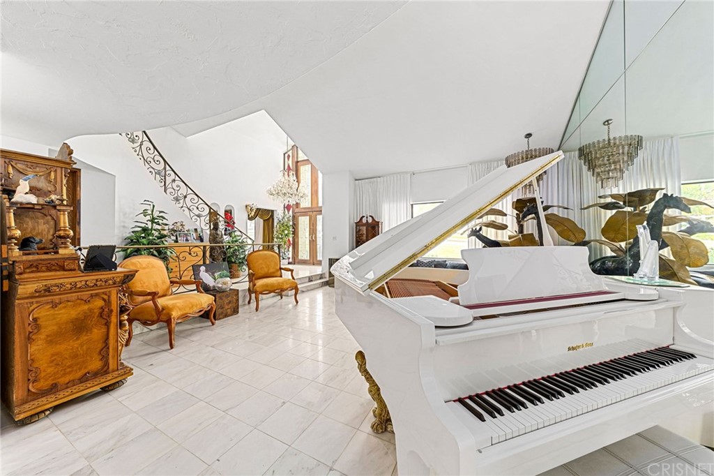 24862 Eldorado Meadow Road Hidden Hills, CA 91302 - Photo 6 of 16 a living room with furniture