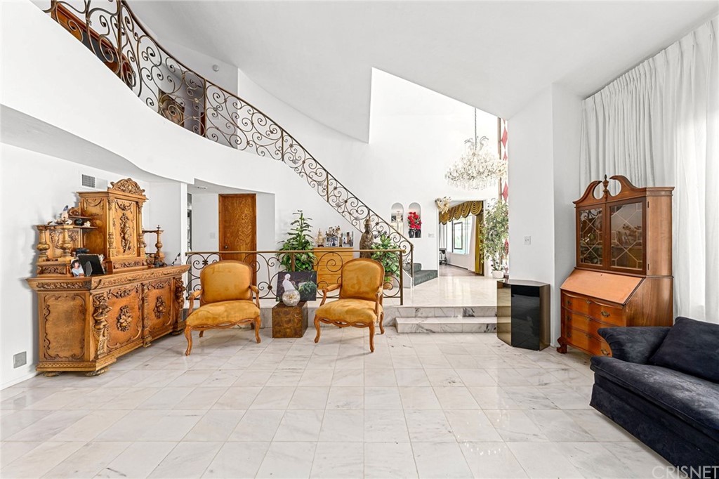 24862 Eldorado Meadow Road Hidden Hills, CA 91302 - Photo 8 of 16 a living room with furniture and a large window