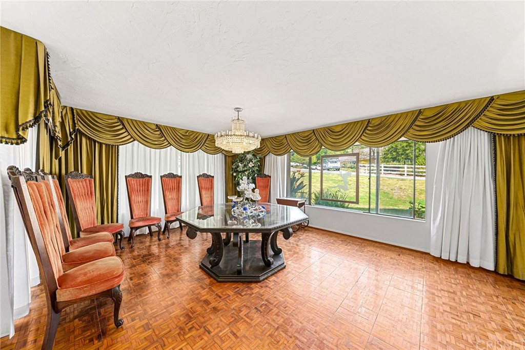 24862 Eldorado Meadow Road Hidden Hills, CA 91302 - Photo 10 of 16 a view of a patio with table and chairs