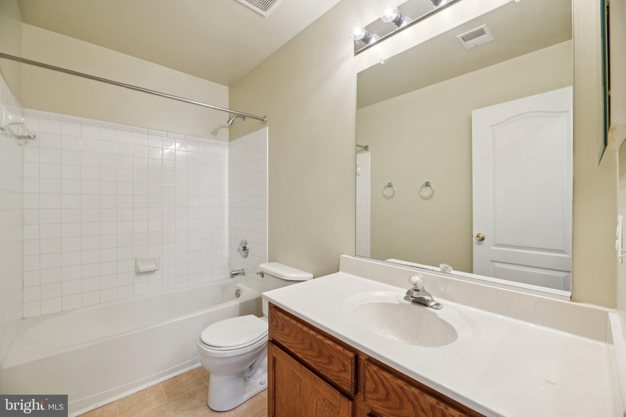 14505 Pleffner Court Bowie, MD 20720 - Photo 23 of 41 a bathroom with a sink a toilet and shower