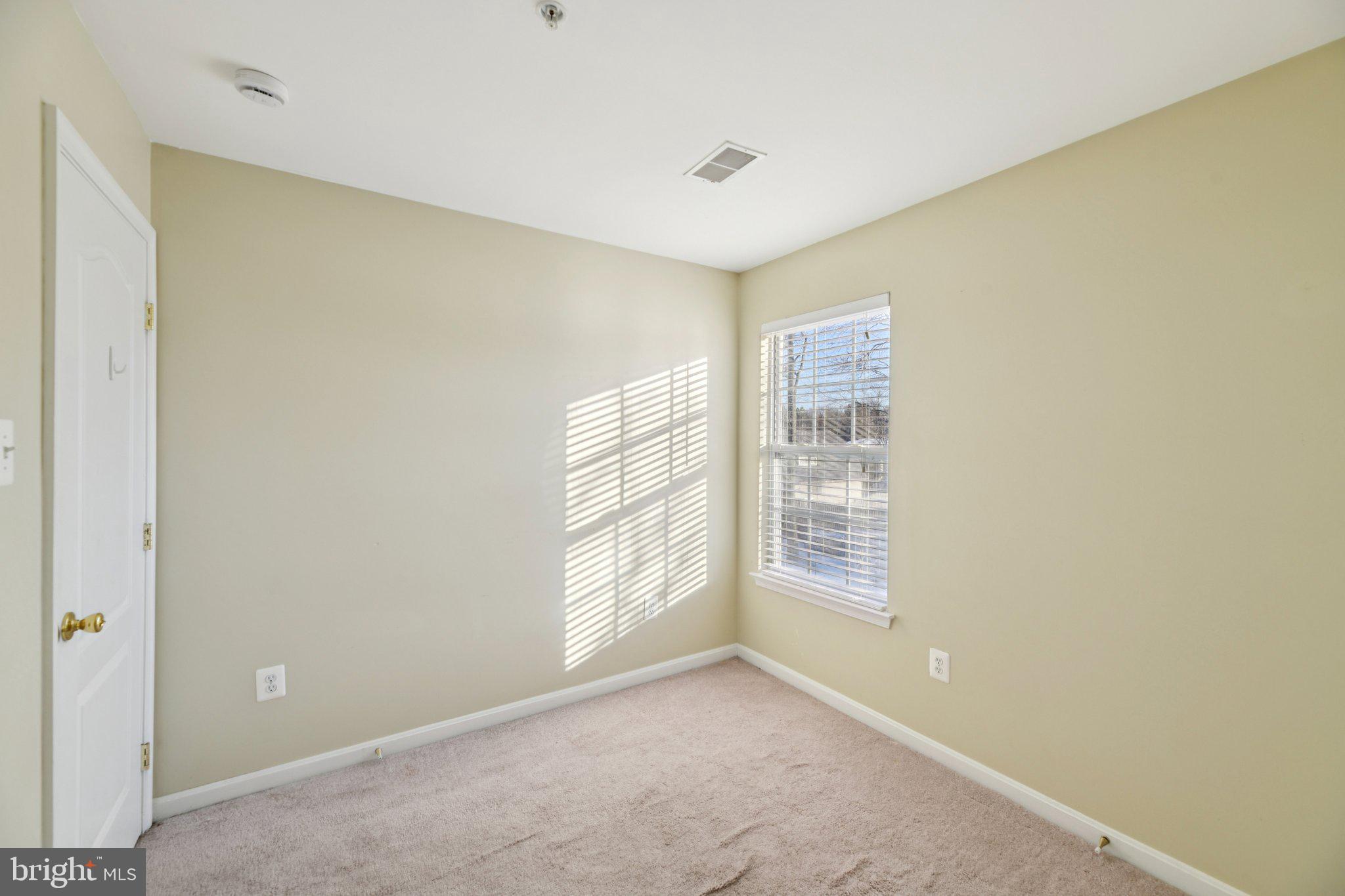14505 Pleffner Court Bowie, MD 20720 - Photo 30 of 41 a view of an empty room with a window