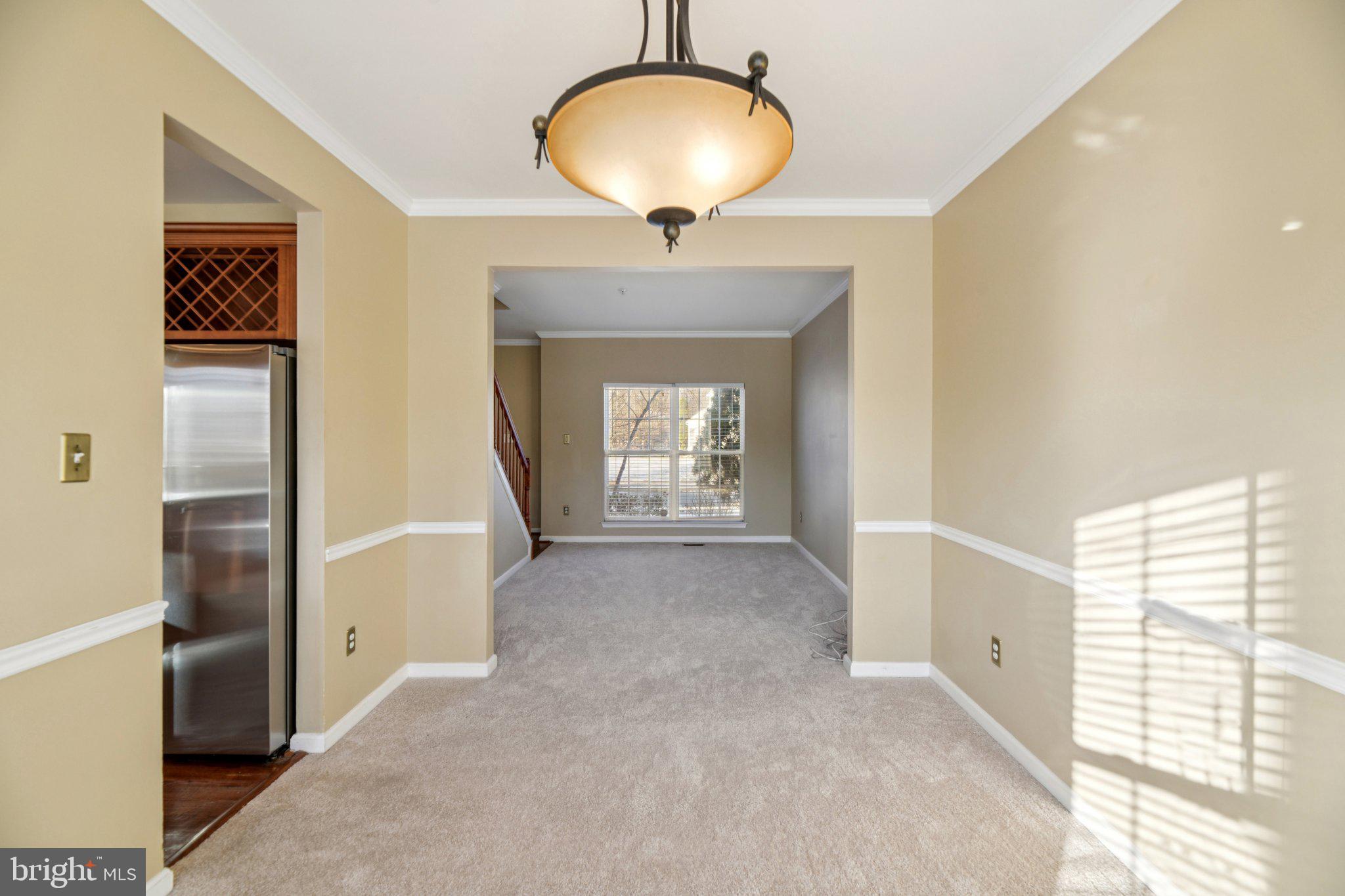 14505 Pleffner Court Bowie, MD 20720 - Photo 10 of 41 a view of a livingroom with a chandelier