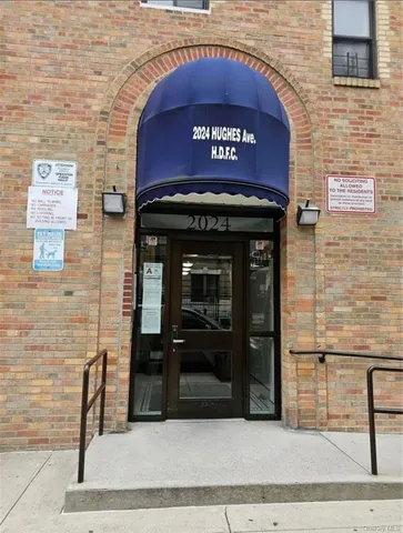 a close view of a bench in front of building