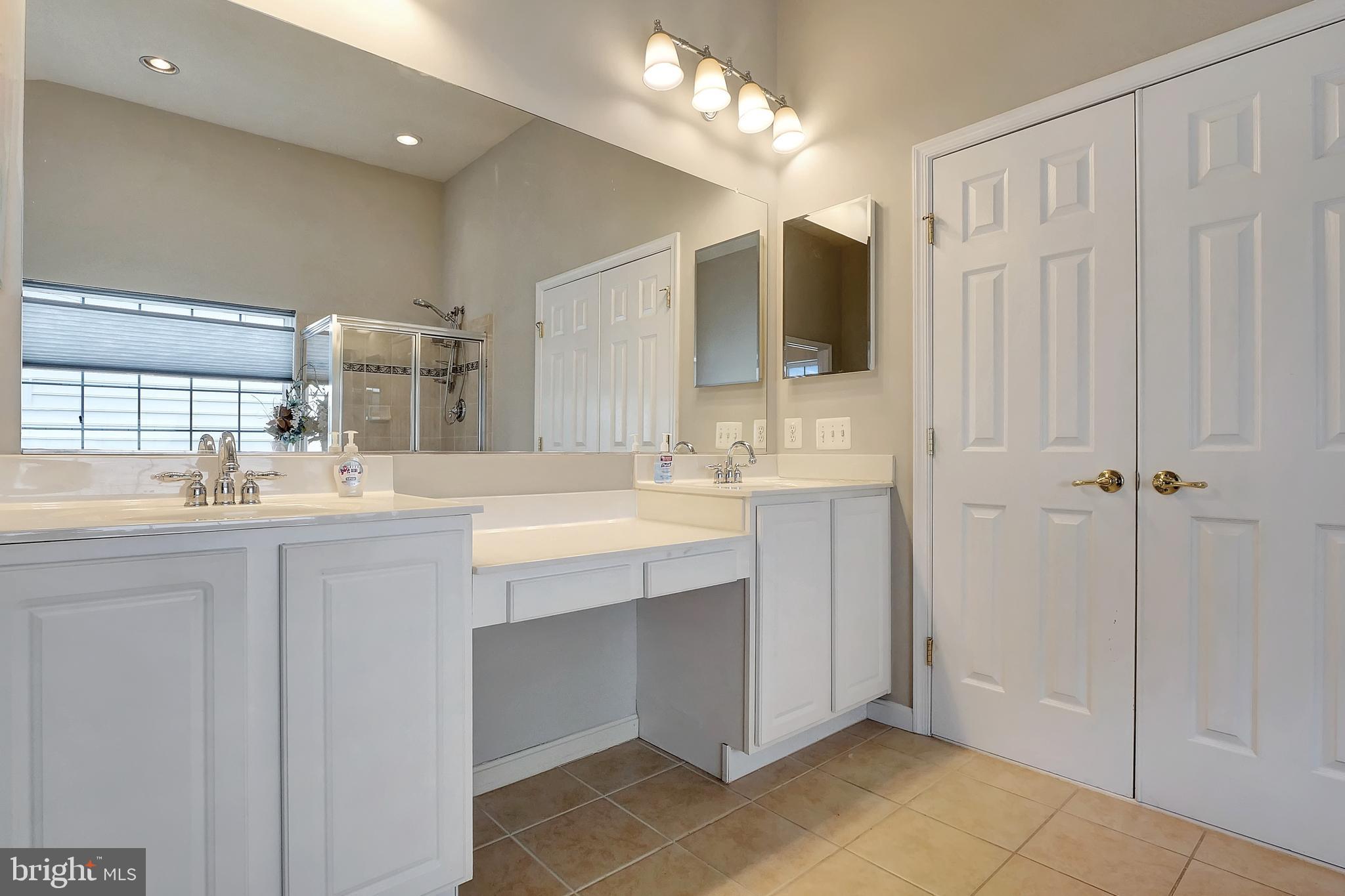 2683 Cast Off Loop Woodbridge, VA 22191 - Photo 25 of 46 Primary bathroom with dual vanity & make-up table