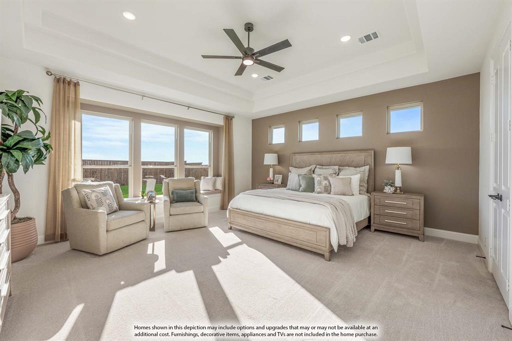 1145 Hitching Post Way Oak Point, TX 75068 - Photo 24 of 36 a bedroom with a large bed couch and a large window