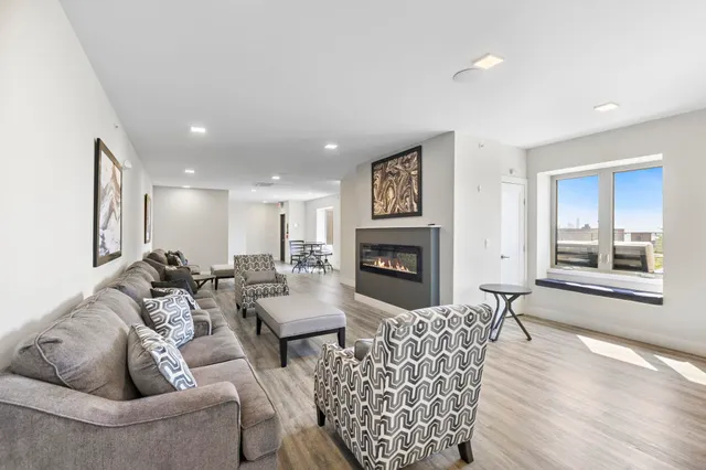 a view of kitchen and living room with furniture