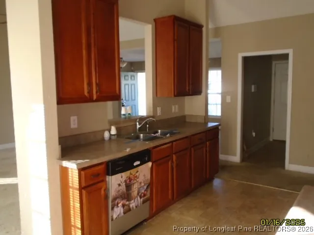a kitchen with a sink and a cabinets