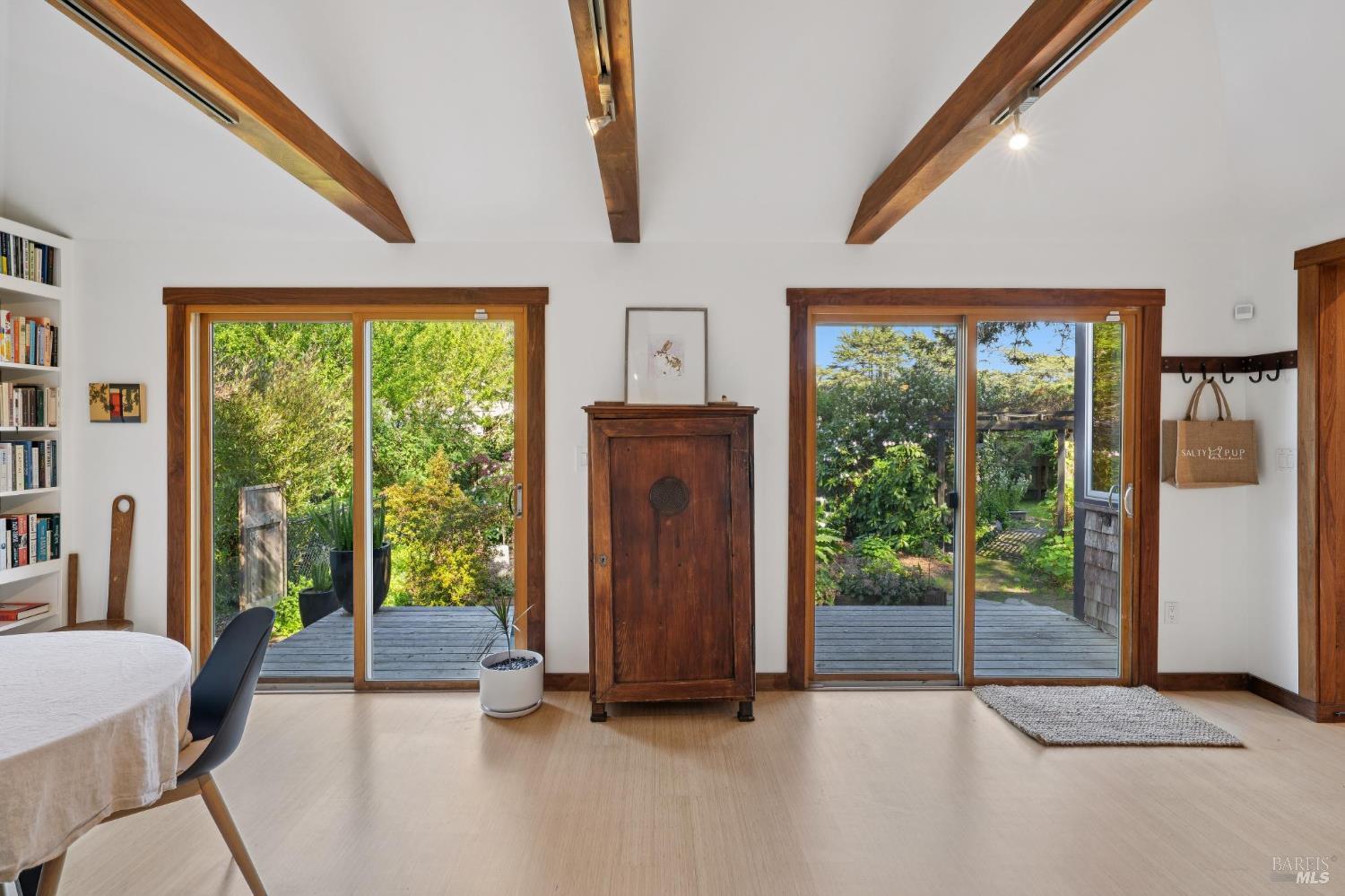 180 Maple Road Bolinas, CA 94924 - Photo 63 of 99 2 sliding glass doors in cottage leading to the outdoor deck