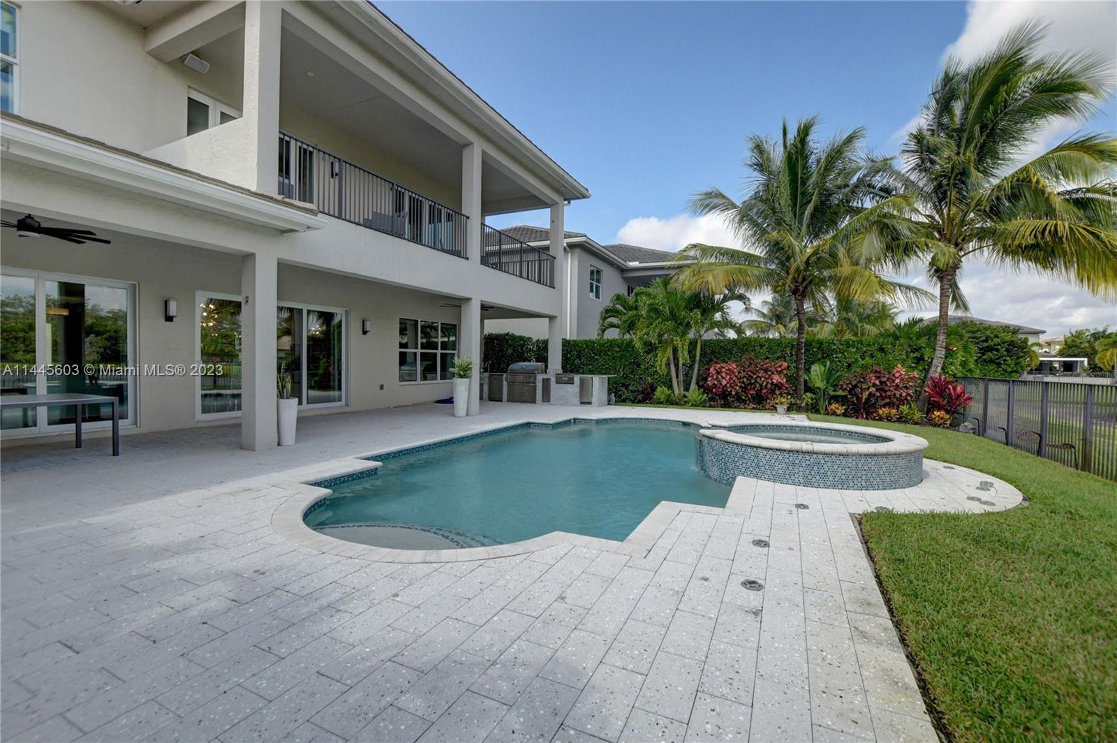 11655 Windy Frst Way Boca Raton, FL 33498 - Photo 56 of 69 a view of a house with swimming pool