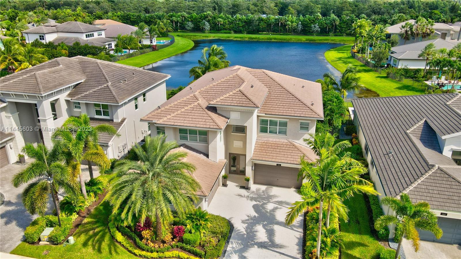 11655 Windy Frst Way Boca Raton, FL 33498 - Photo 67 of 69 an aerial view of house with yard space and lake view in back