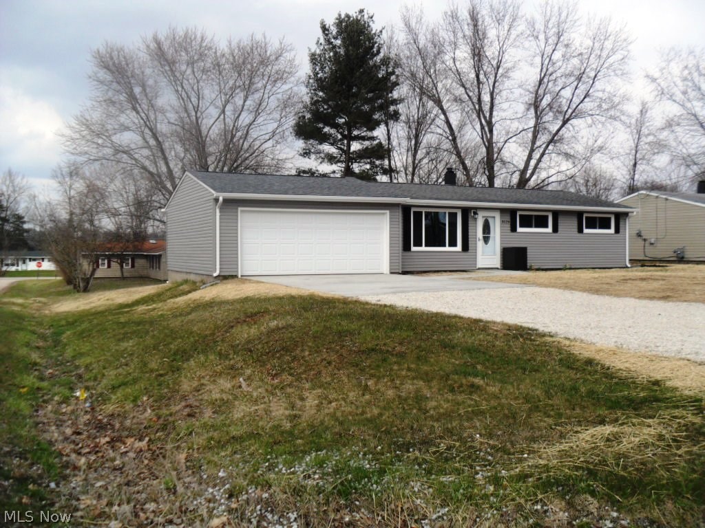 3125 Polly Road Ravenna, OH 44266 - Photo 33 of 34 NEW 2018 gutters & downspouts. Insulation was also added to house.
Left view of the house.