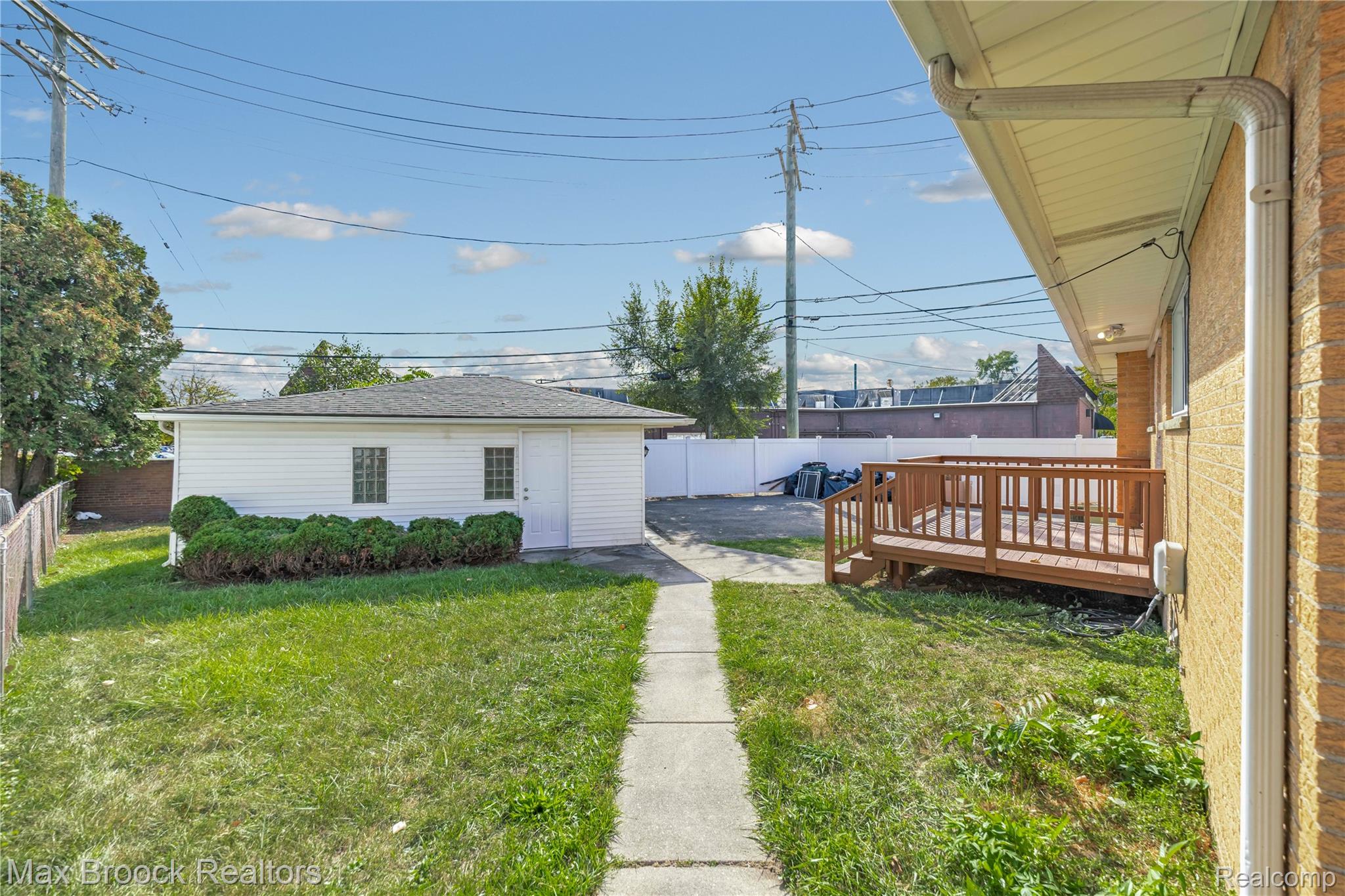 1544 Sheffield Road Birmingham, MI 48009 - Photo 39 of 51 Fenced backyard with a deck