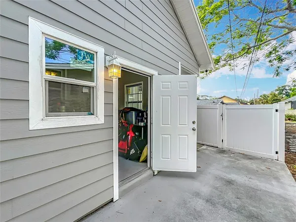 a front view of house with outdoor seating