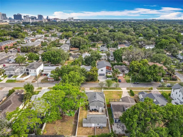 an aerial view of a house with a garden