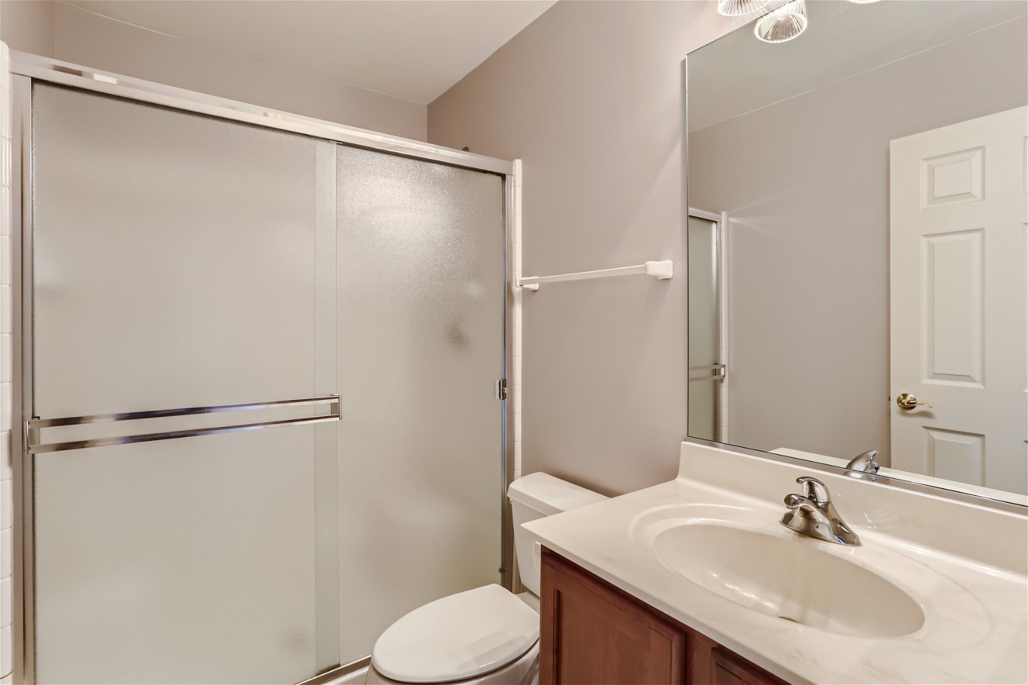1840 Beachview Road Pingree Grove, IL 60140 - Photo 11 of 28 a bathroom with a sink and a mirror