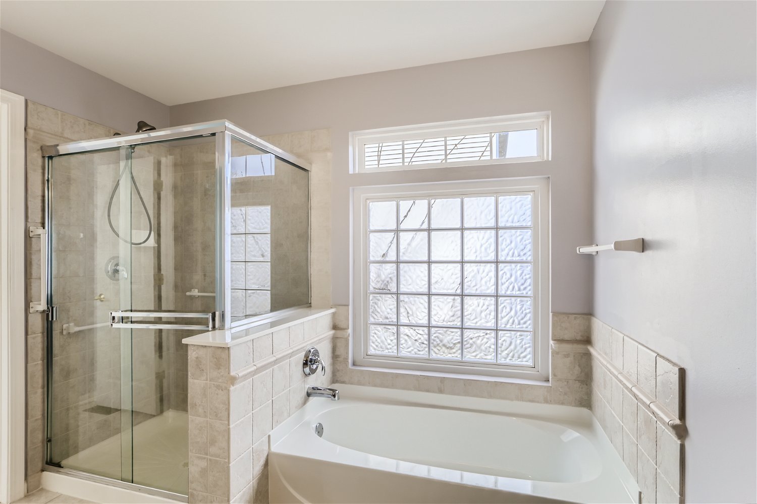 1840 Beachview Road Pingree Grove, IL 60140 - Photo 13 of 28 a bathroom with a bathtub and a shower